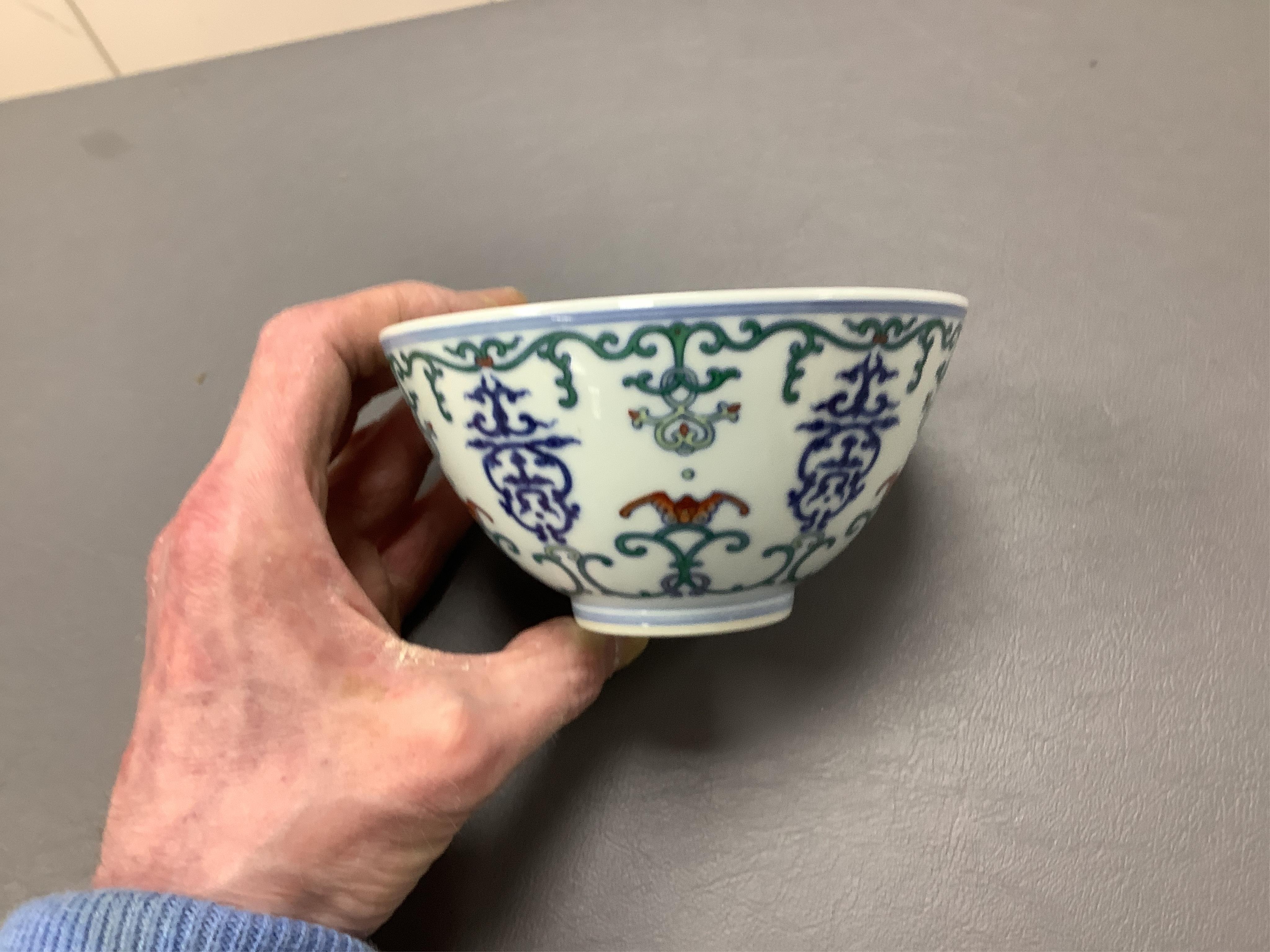 A Chinese porcelain doucai bowl, 13cm in diameter